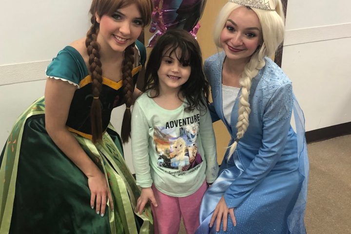 a group of people posing for the camera