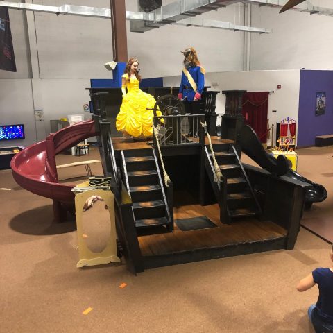 a couple of people that are standing in a room