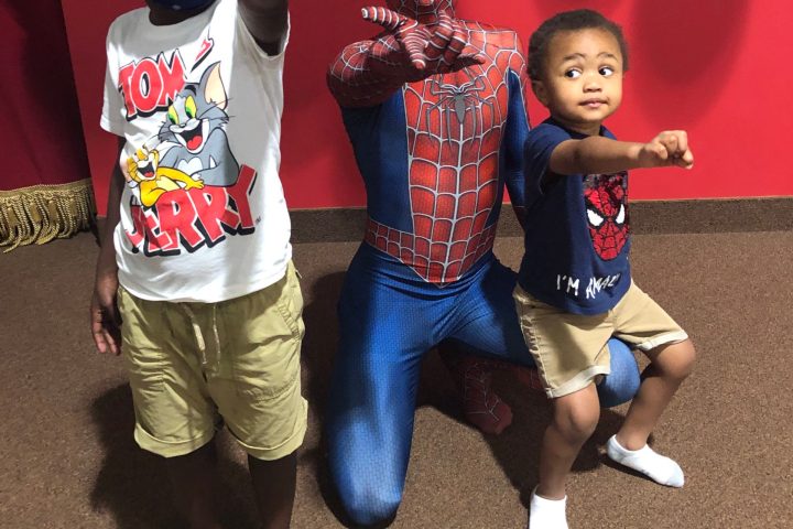 a little boy that is standing in a room