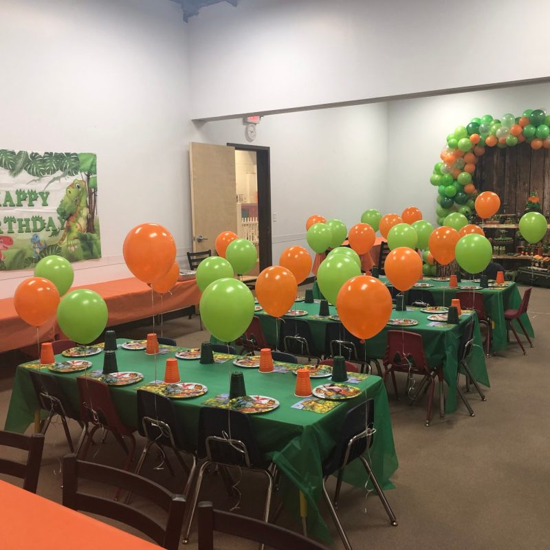 a room filled with furniture and a table