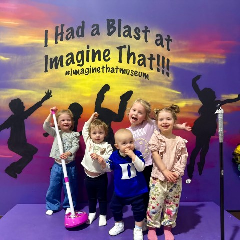 a group of people posing for the camera