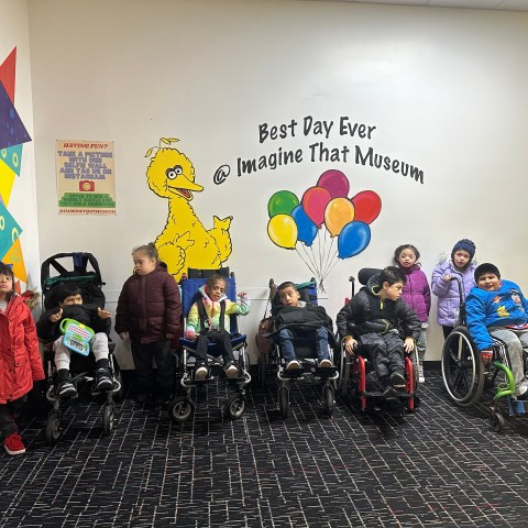 a group of people posing for the camera