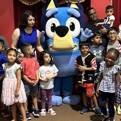 a group of people posing for the camera