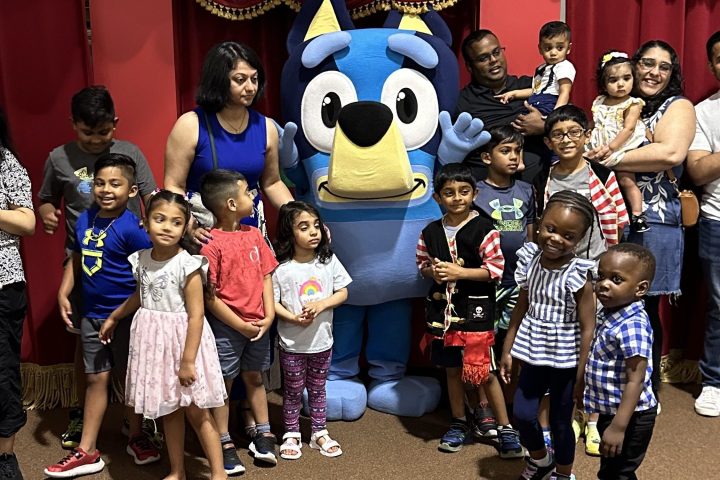 a group of people posing for the camera