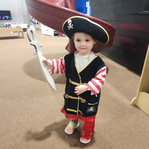 a little boy wearing a hat