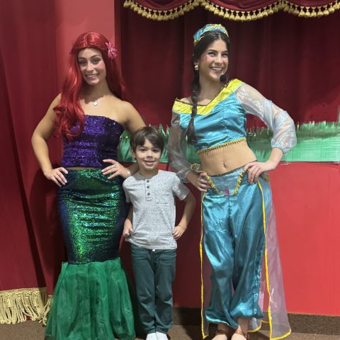 a group of people posing for the camera