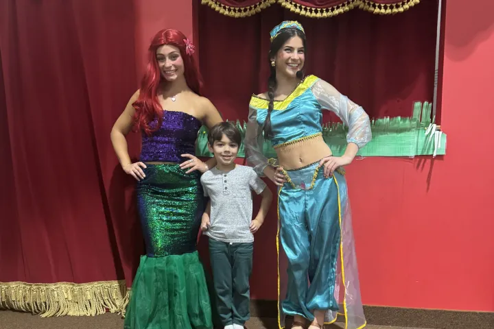 a group of people posing for the camera